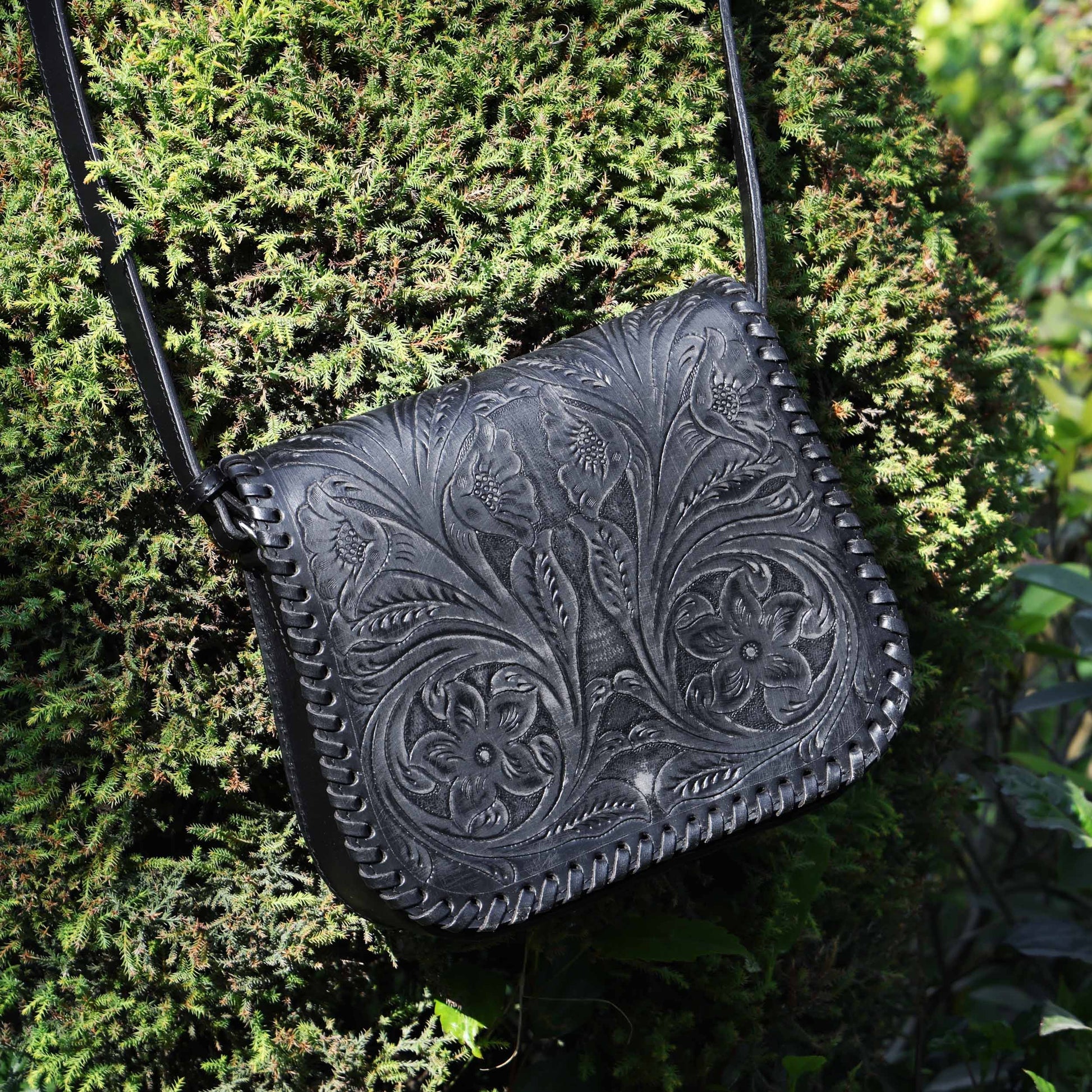 Handcrafted Black Embossed Leather Sling Bag with Magnetic Closure & Adjustable Strap