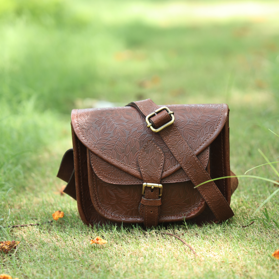Vintage Floral Embossed Leather Sling Bag with Front Pocket Handcrafted Crossbody