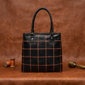 Women's Black Leather Tote Bag with Orange Stitch Grid and Spacious Interior
