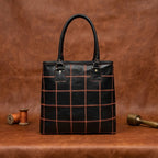 Women's Black Leather Tote Bag with Orange Stitch Grid and Spacious Interior