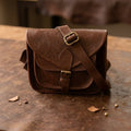 Vintage Floral Embossed Leather Sling Bag with Front Pocket Handcrafted Crossbody