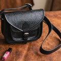 Vintage Embossed Leather Sling Bag with Buckle Flap & Front Pocket