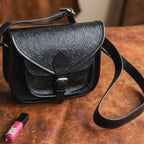Vintage Embossed Leather Sling Bag with Buckle Flap & Front Pocket