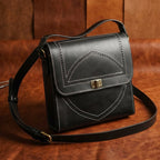 Black Structured Leather Crossbody Bag with Contrast Stitching & Secure Turn-Lock